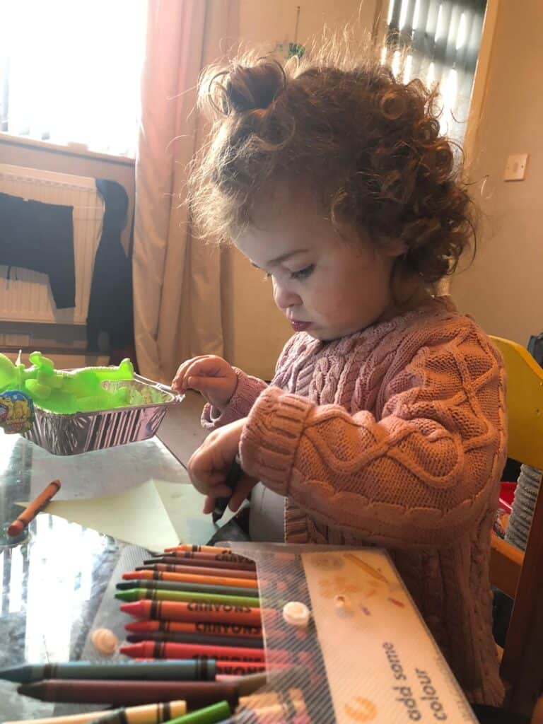 Toddler playing with toys