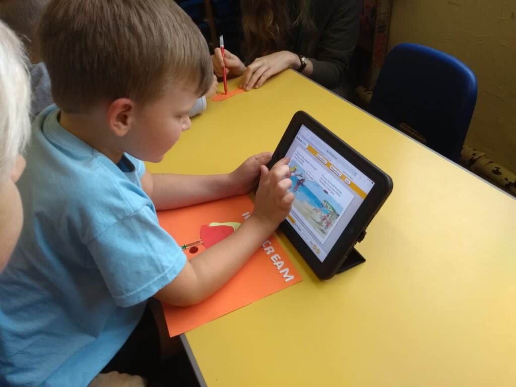 Photo of child with tablet