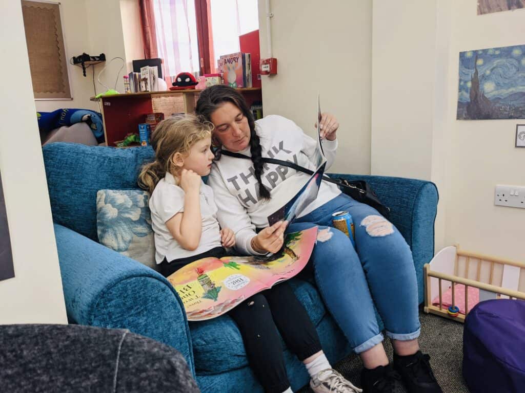 Child and parent reading