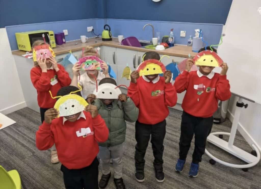 A group of children with masks